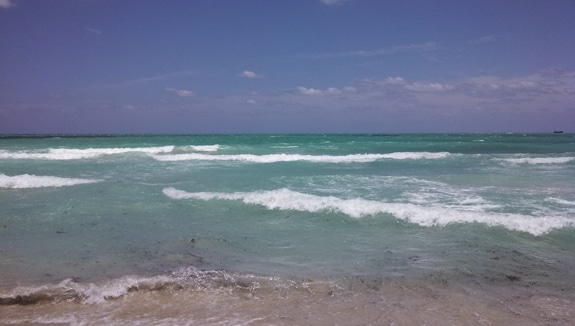 A Landscape-Style Image of Waves Crashing Onto the Beach