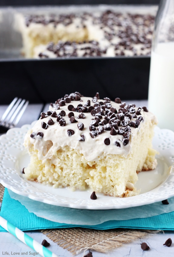 Cannoli Poke Cake - vanilla cake topped with cannoli filling icing!