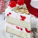 A Slice of Cherry Almond Amaretto Ice Cream Cake on a white plate