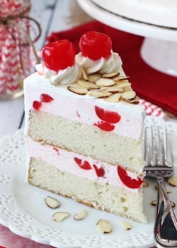 A Slice of Cherry Almond Amaretto Ice Cream Cake on a white plate