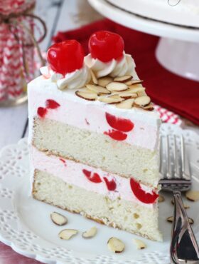 Cherry Almond Amaretto Ice Cream Cake slice on white plate