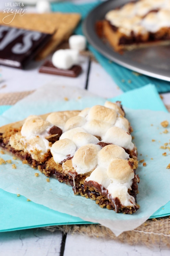 A slice of Smores Pizza on wax paper