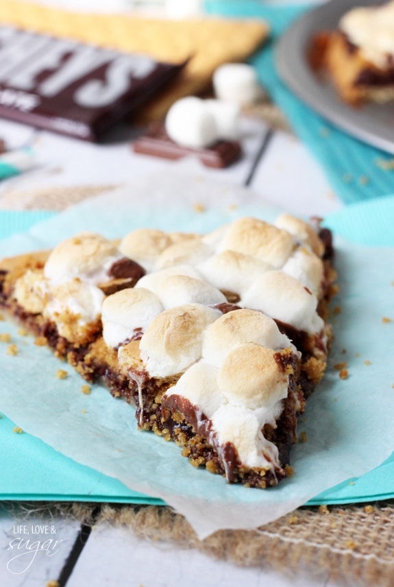 A slice of Smores Pizza on wax paper