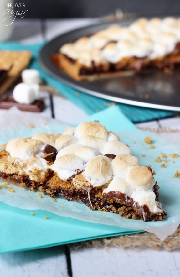 A slice of Smores Pizza on wax paper