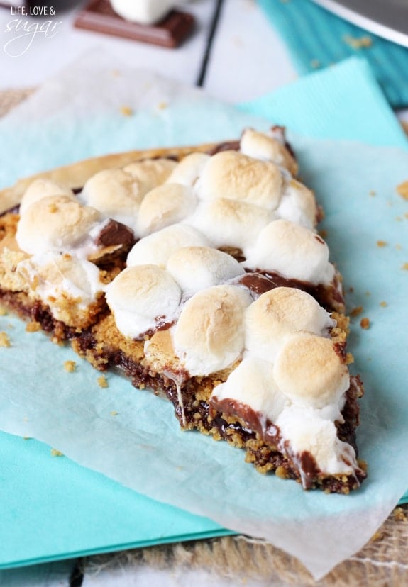 A slice of Smores Pizza on wax paper