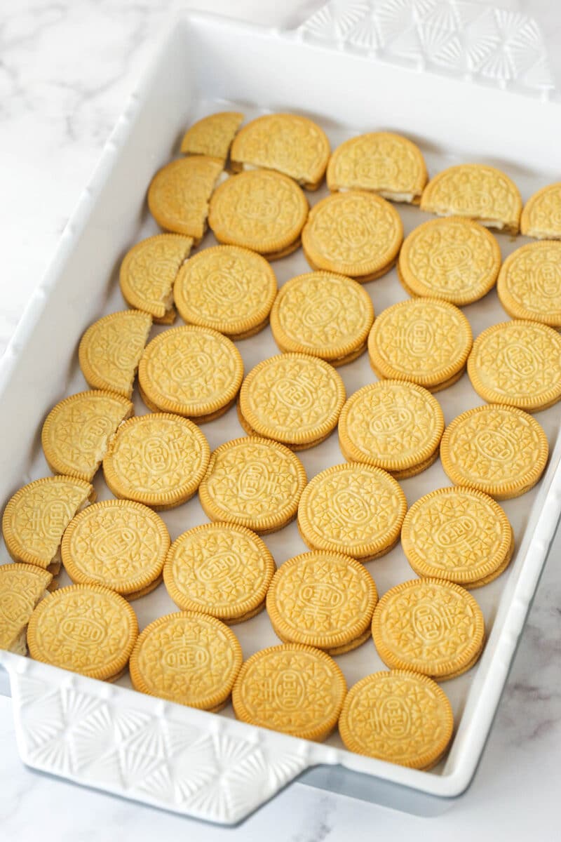 a layer of golden oreos in a 9x13 pan