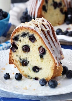 A Slice of Blueberry Coconut Bundt Cake on a plate