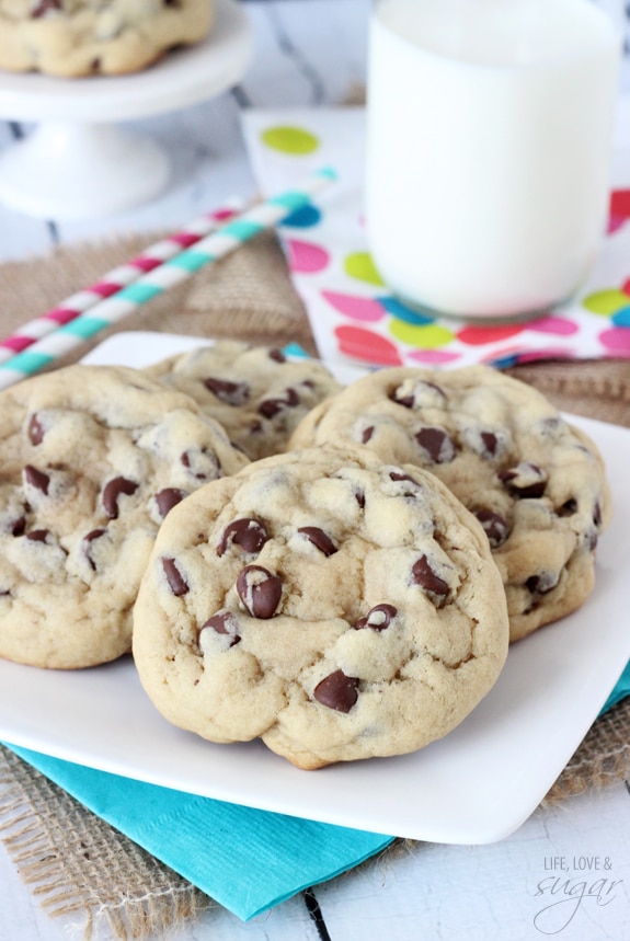 Bakery Style Chocolate Chip Cookies arranged on a white plate