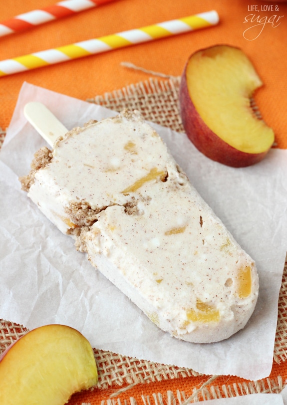 A Peach Streusel Popsicle on wax paper