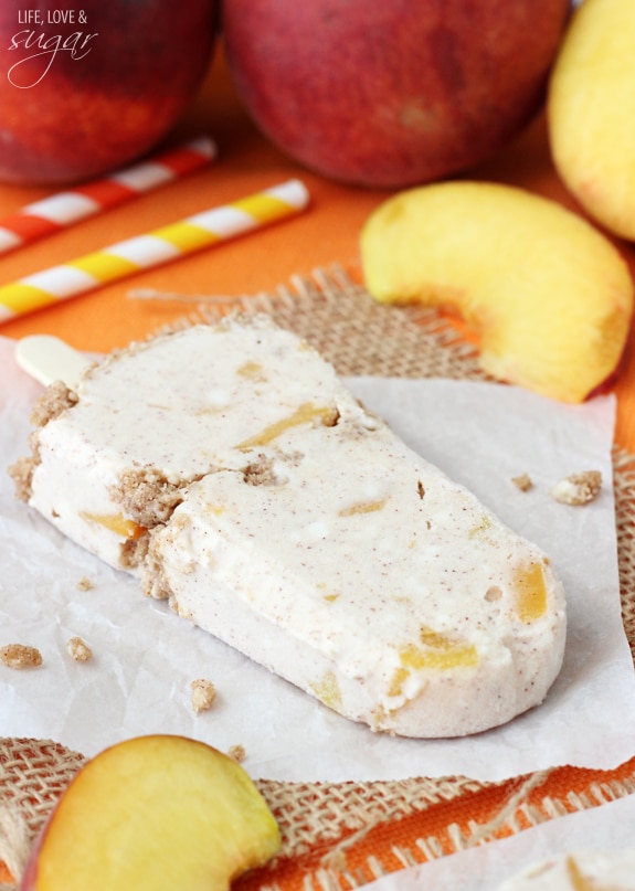 A Peach Streusel Popsicle on wax paper