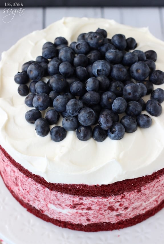 Overhead view of Red Velvet Ice Cream Cake topped with blueberries
