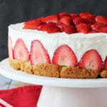 Strawberry Shortcake Cheesecake on white stand