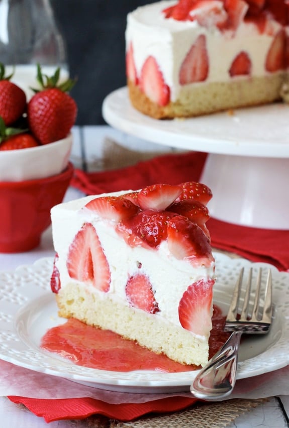 Strawberry Shortcake Cheesecake - shortcake topped with strawberries, no bake vanilla cheesecake and whipped cream!
