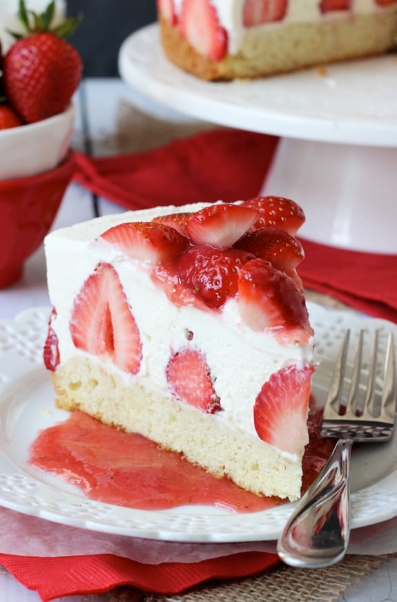 Strawberry Shortcake Cheesecake - shortcake topped with strawberries, no bake vanilla cheesecake and whipped cream!