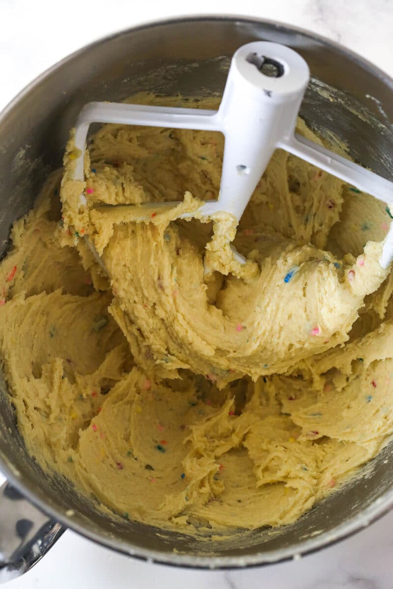 A mixing bowl with cookie dough