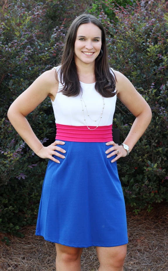 Lindsay Modeling Her Blue and Pink July Stitch Fix Dress With her Hands on her Hips