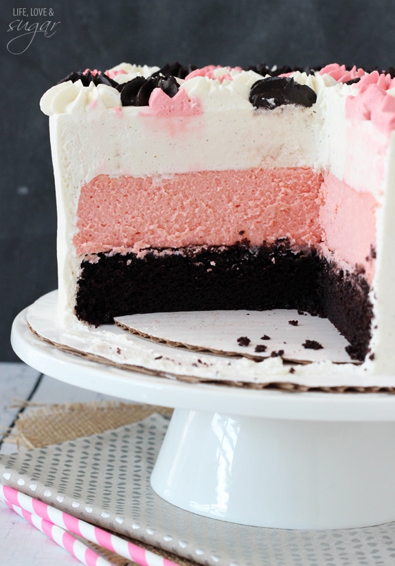Neapolitan Millionaire Cake with a couple slices removed