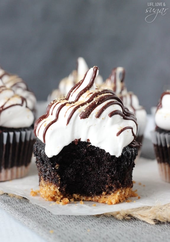 S'mores Cupcakes - super moist chocolate cupcakes with a graham cracker crust, topped with a light marshmallow frosting!