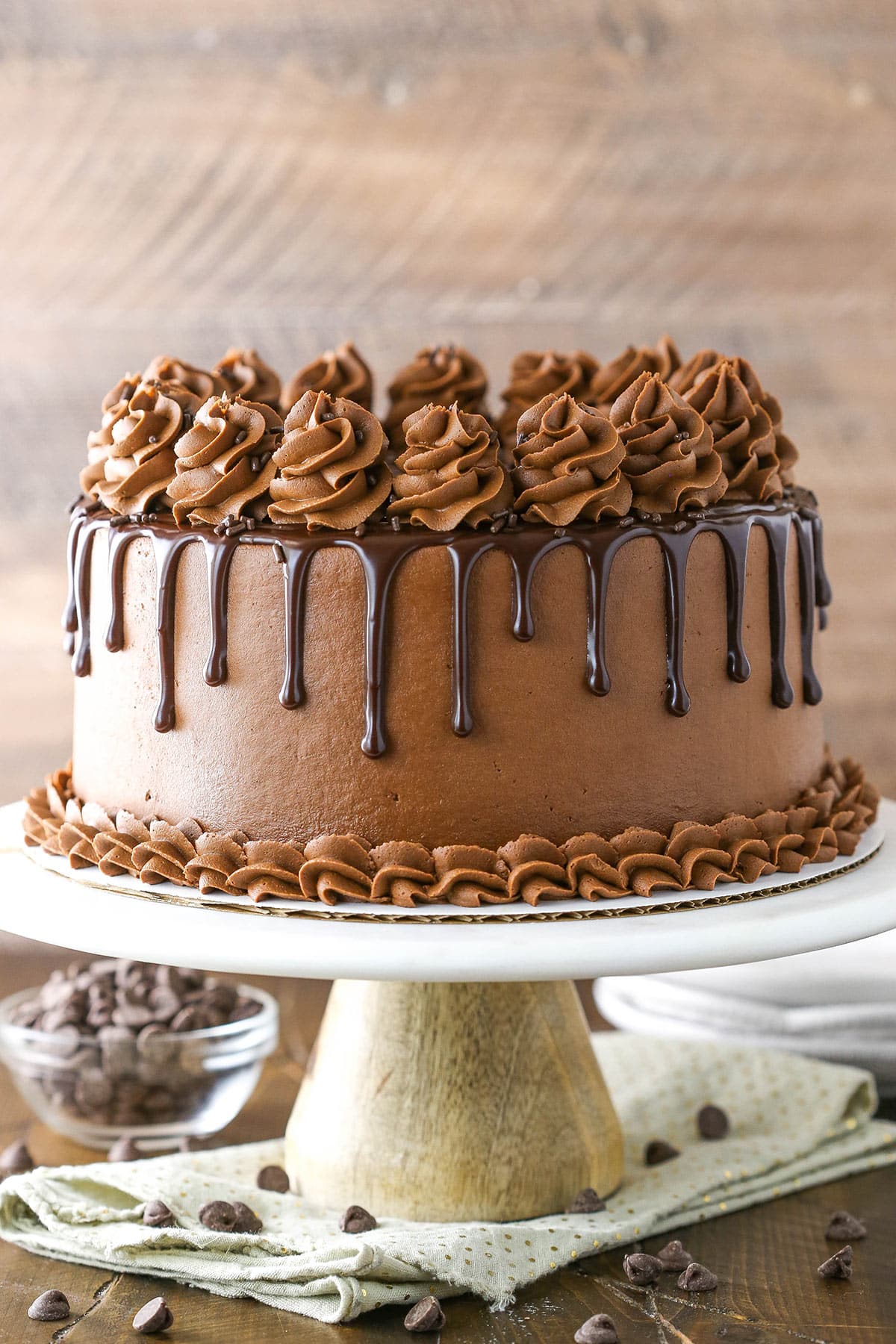 A homemade chocolate cake on a cake stand