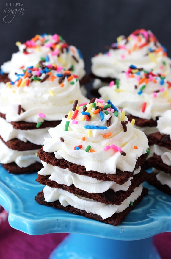 Birthday Cake Brownie Brittle Icebox Cupcakes on a blue cake stand