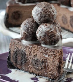 Chocolate Donut Hole Cheesecake slice on purple plate