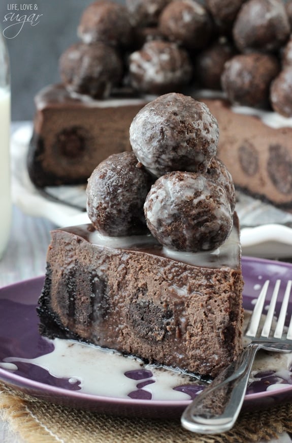 A Slice of Chocolate Donut Hole Cheesecake on a purple plate