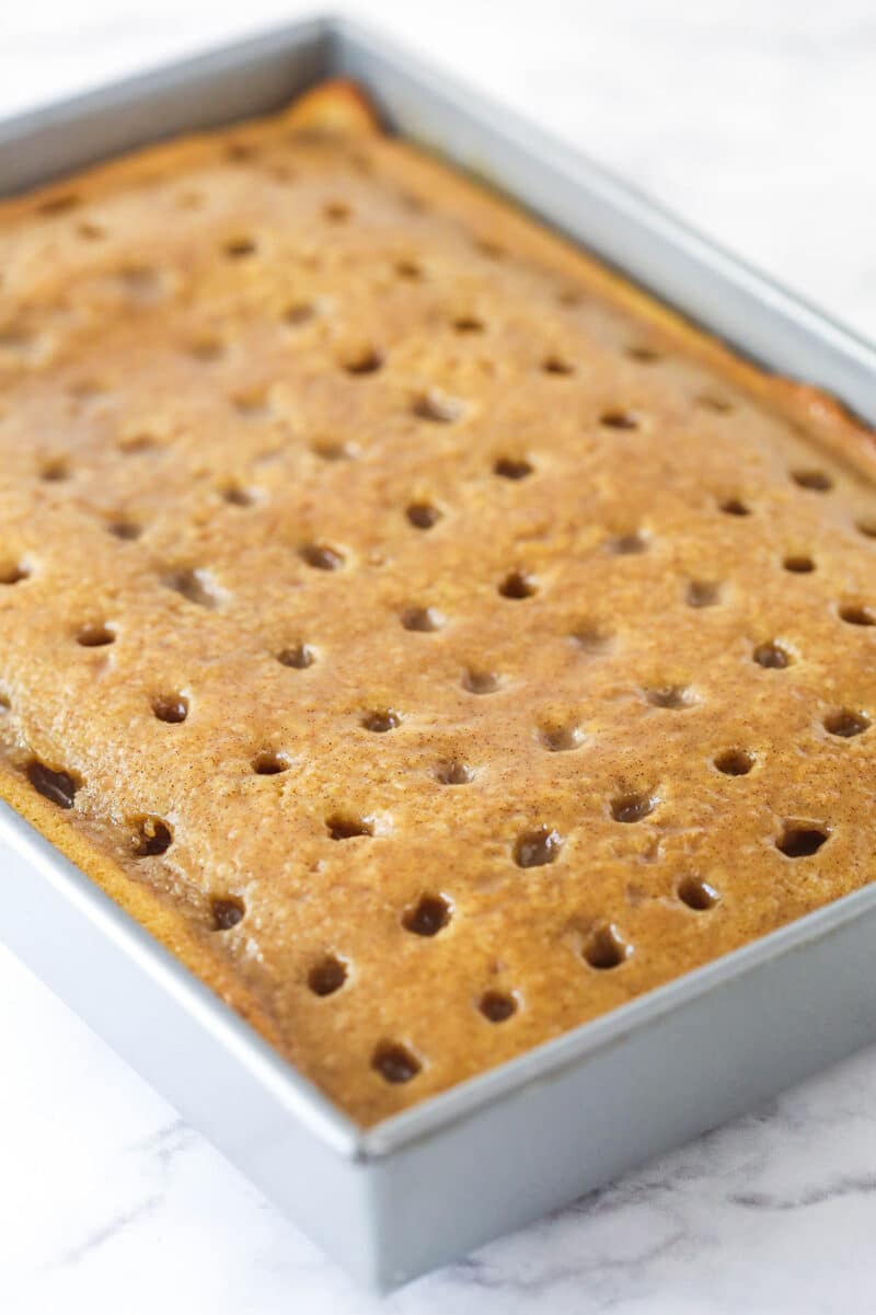 Unfrosted cinnamon roll poke cake
