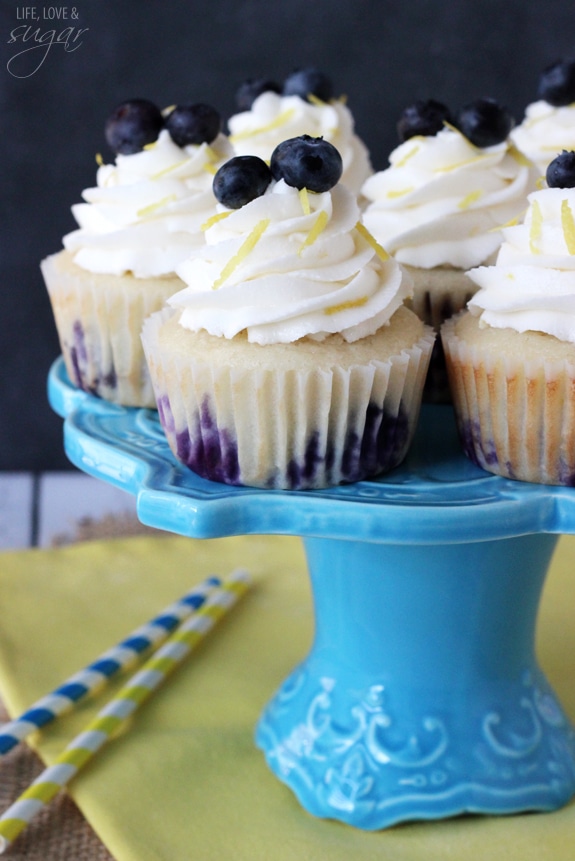 Lemon Blueberry Cupcakes on a blue cake stand