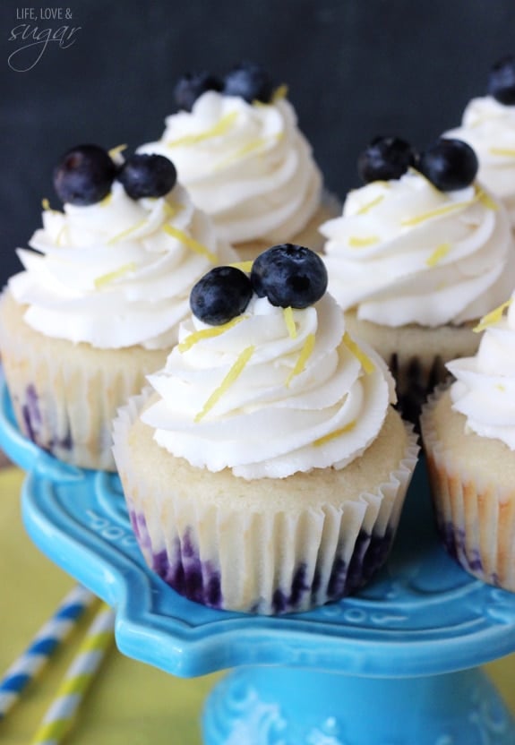 Lemon Blueberry Cupcakes on a blue cake stand