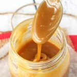 Easy Caramel Sauce in mason jar with spoon