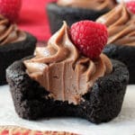 Nutella Cheesecake Chocolate Cookie Cups with bite missing