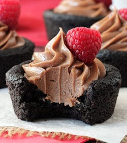 Nutella Cheesecake Chocolate Cookie Cups with bite missing