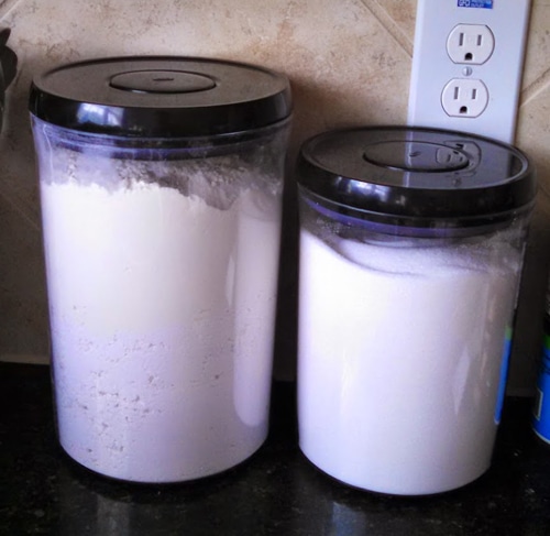 Two Clear Containers Filled with Flour and Sugar