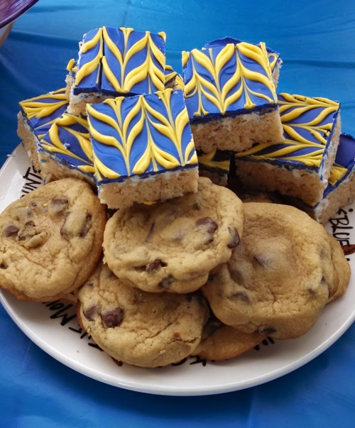 Chocolate Chip Cookies and Blue & Gold Frosted Rice Krispie Treats on a Plate