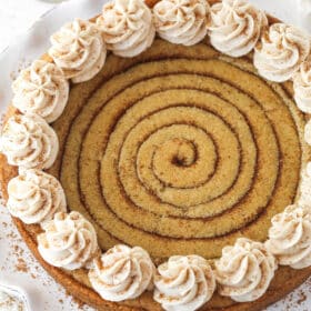 Overhead view of a cinnamon roll cookie cake