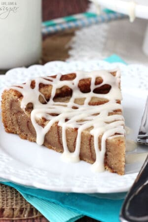 A Slice of Cinnamon Roll Cookie Cake on a plate