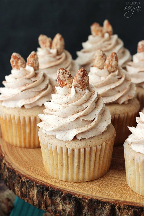 Cinnamon Sugar Almond Cupcakes on a wooden board