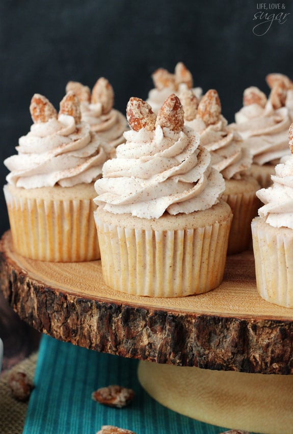 Cinnamon Sugar Almond Cupcakes on a wooden board