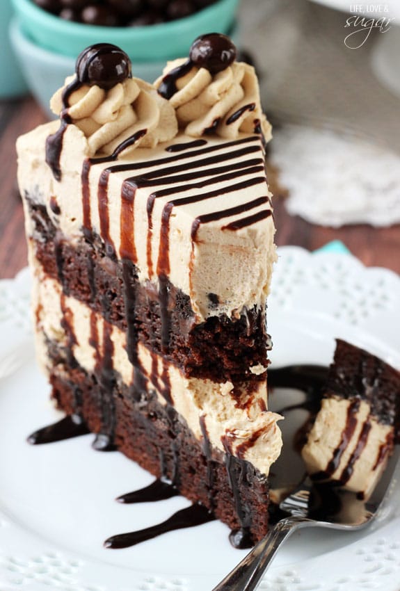 Mocha Brownie Ice Cream Cake slice on a plate with a bite on a fork