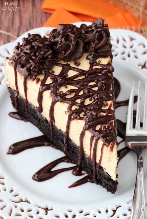 Pumpkin Chocolate Brownie Cheesecake slice on a plate