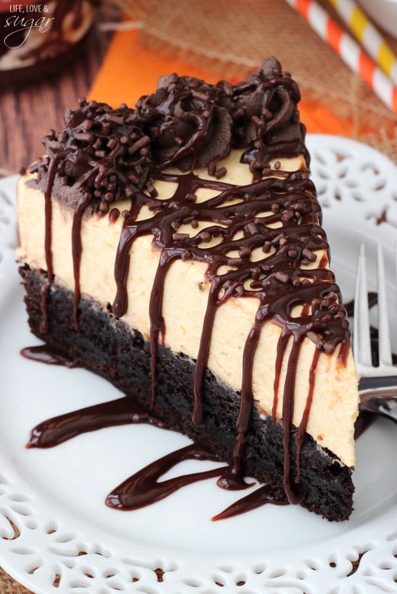 Pumpkin Chocolate Brownie Cheesecake slice on a plate