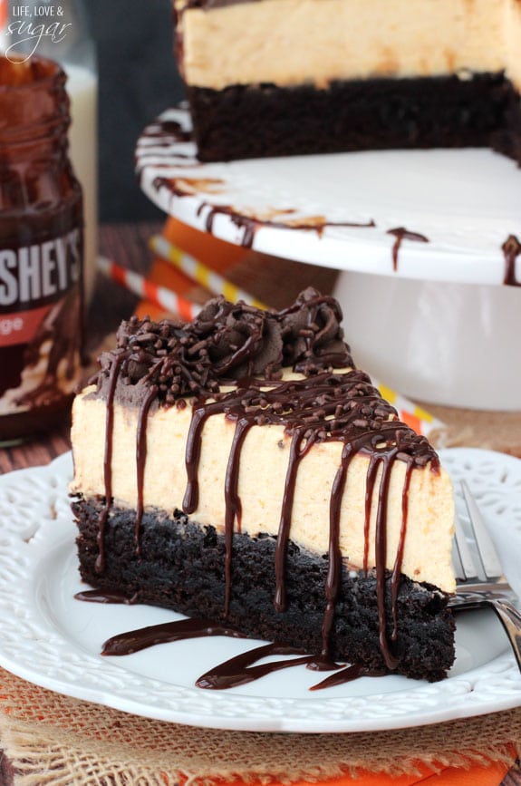 Pumpkin Chocolate Brownie Cheesecake slice on a plate