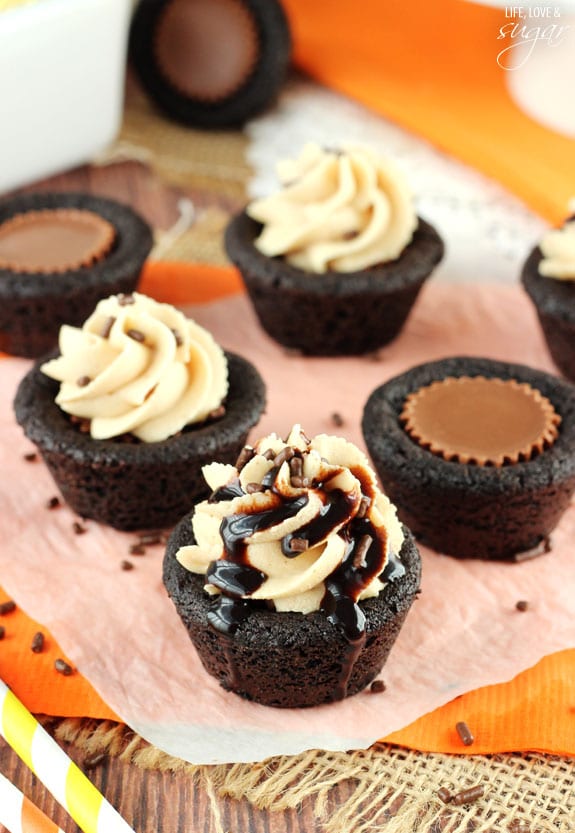 Chocolate cookies stuffed with Reese's Peanut Butter Cups on a table