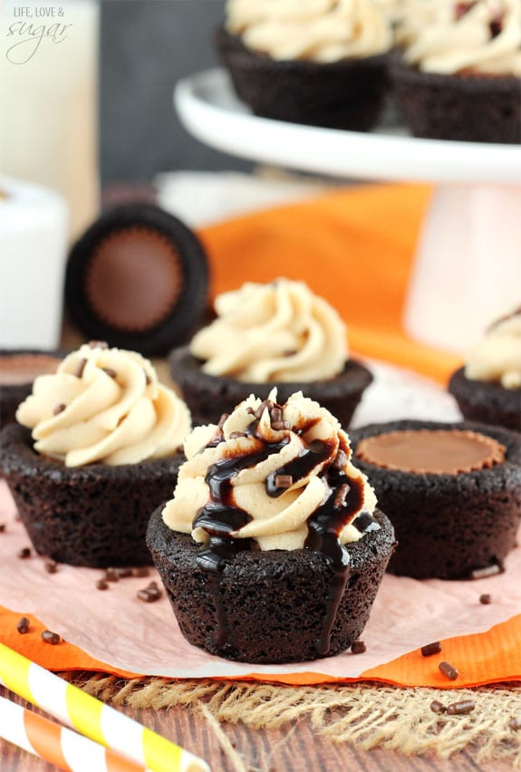 Reese's Peanut Butter Cookies with frosting on a table 