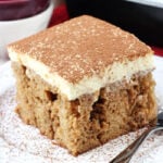 Tiramisu Poke Cake on white plate