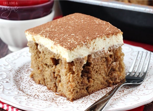 Tiramisu Poke Cake on white plate