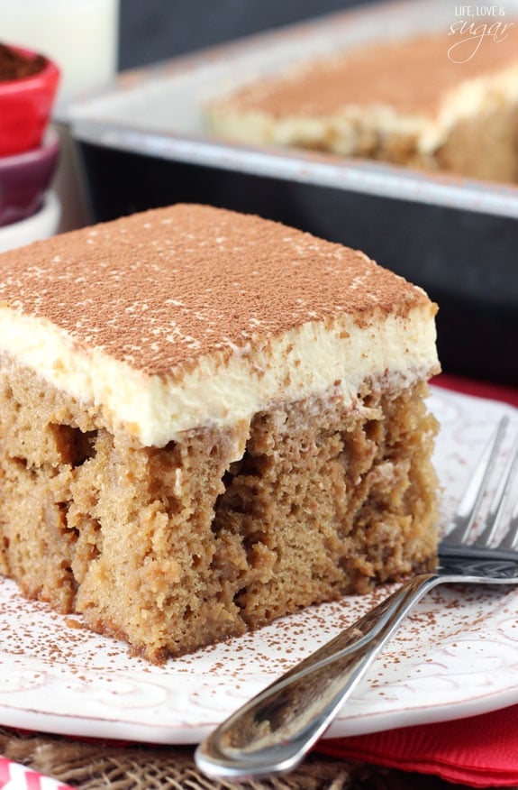 Tiramisu Poke Cake on white plate