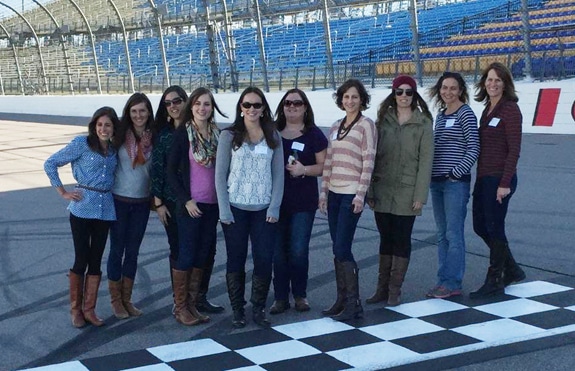 a group of ladies on the track at the speedway
