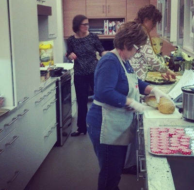 three women cooking in the test kitchen