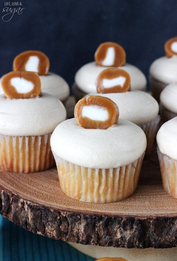 Caramel Cream Cupcakes on a wooden board